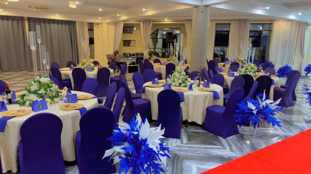 Dream Events ceremony setup with layered floral decor