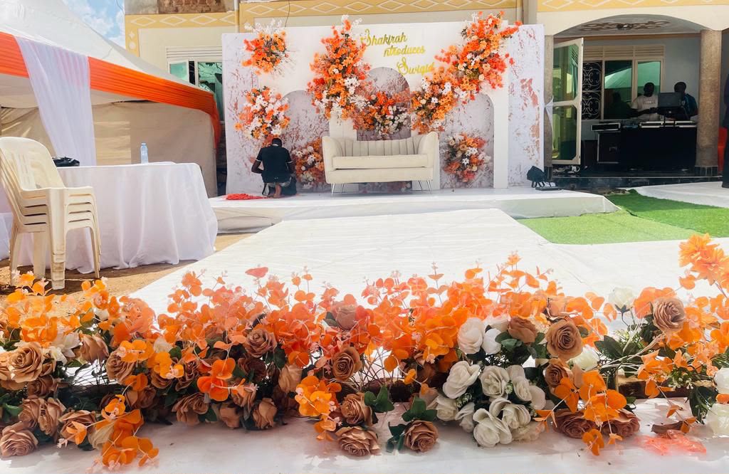 Dream Events ceremony setup with layered floral decor
