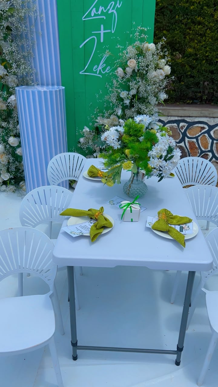 Dream Events ceremony setup with layered floral decor